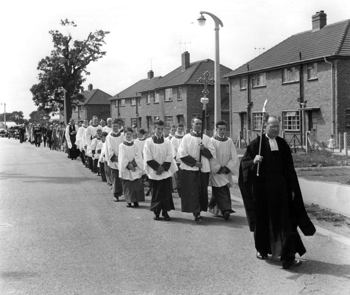 Marching along Harrowby Lane to open new church