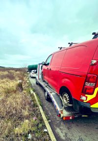Van with insecured load taken off road